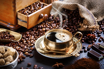 Black coffee on old background