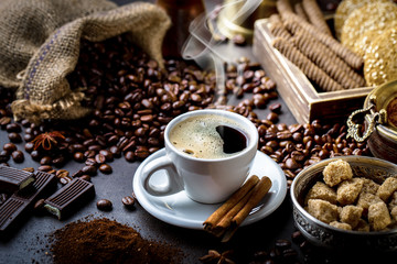 Black coffee on old background