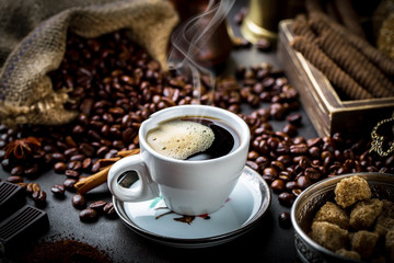 Black coffee on old background
