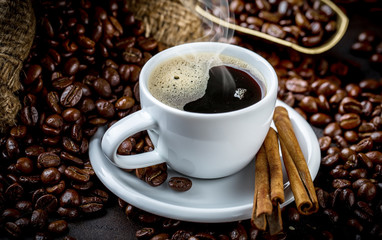 Black coffee on old background