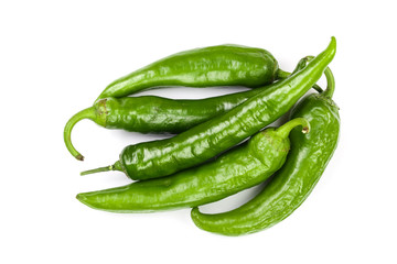 green hot chili peppers isolated on white background. Top view. Flat lay pattern