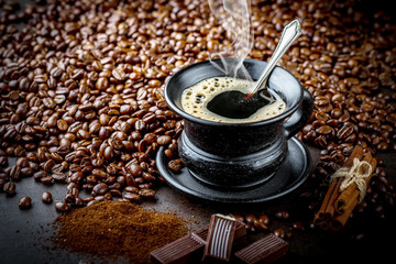 Black coffee on old background