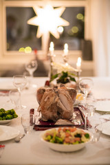Christmas or Thanksgiving turkey on rustic wooden table
