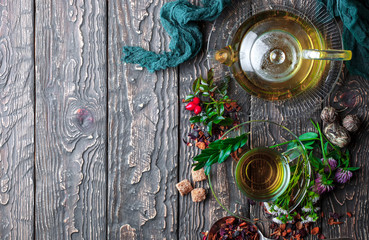 Tea on an old background, in a composition with accessories on the table