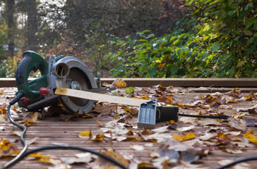 A set of tools for construction and repair, for carpenters. Circular saw.