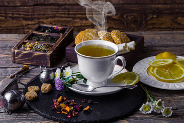 Tea in a cup on an old background