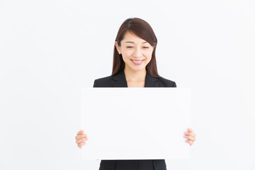 Naklejka premium ホワイトボードを持つ女性 ビジネス