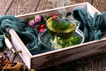 Tea in a cup on an old background