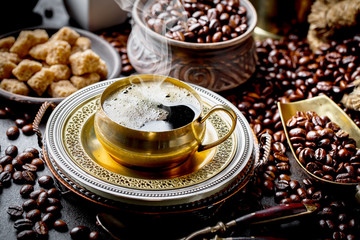 Black coffee on old background