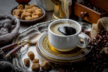 Black coffee on old background
