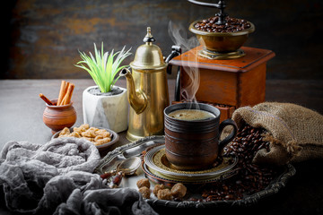 Black coffee on old background