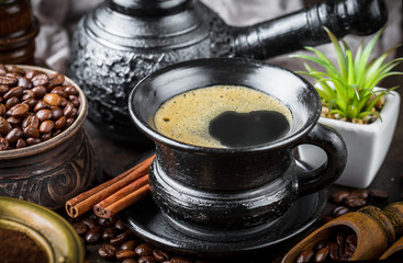 Black coffee on old background