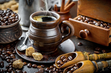 Black coffee on old background