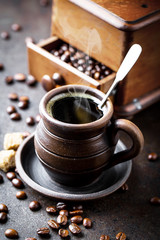 Black coffee on old background