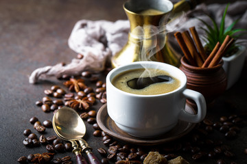 Black coffee on old background