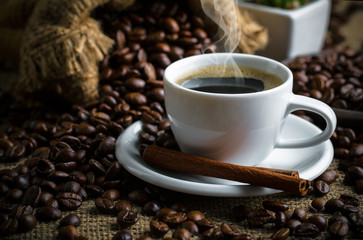 Black coffee on old background