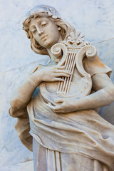 Terpsichore muse statue at the facade of the Adolfo Mejia theater in Cartagena de Indias - obrazy, fototapety, plakaty