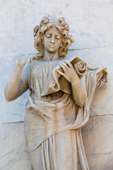 Fototapeta premium Calliope muse statue at the facade of the Adolfo Mejia theater in Cartagena de Indias
