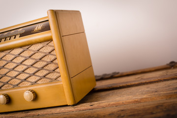 Retro Radio Sitting on Vintage Wooden Trunk