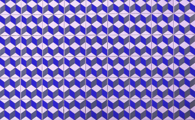 Colorful floor of retro tiles. Repeating geometric patterns of dice on the floor of ceramic tile.