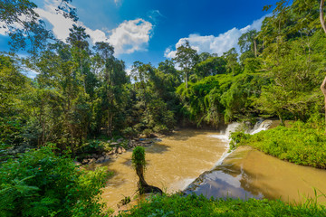 Beautiful waterfall in natural "Si Dit Waterfall" with blue sky in khao kho national park