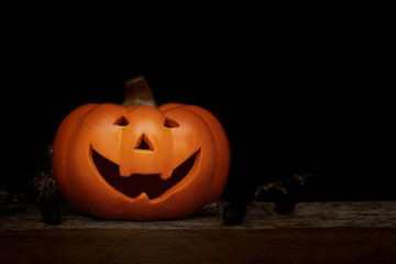 Still life Halloween pumpkin on black background. Halloween concept