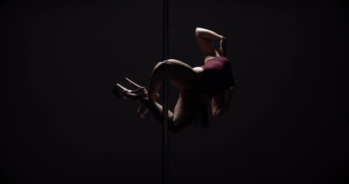 Girl dancing lap dance, beautiful woman doing pole dance, female dancer, fitness and sport. Slow motion