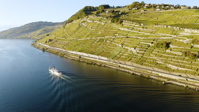 Flying high and going away from CGN Belle-Epoque steam boat on lake L&radic;&copy;man in front of Lavaux vineyard, Switzerland 
Sunset light and autumn colors