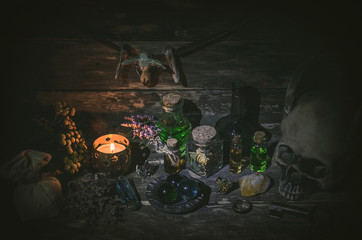 Magic potion on magic table background. Witchcraft concept.