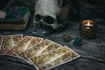Tarot cards on fortune teller desk table background. Futune reading concept. Divination.