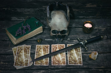 Tarot cards on fortune teller desk table background. Futune reading concept. Divination.