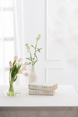 Beautiful Books and flowers on table