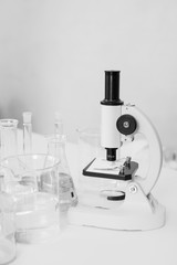 Science microscope laboratory chemical test tube lab glassware equipment. Research and development concept.