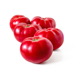 Fresh, large, red, sweet tomatoes, isolated on white background