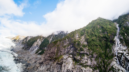 Fototapeta na wymiar Panorama view, Fraz josef Glacier among the mountain view form Roberts Point Track. West coast, New Zealand.