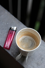 Hot coffee in disposable cup ready to dring