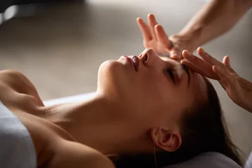 Foto auf Glas Head and face massage in spa salon © serhiipanin