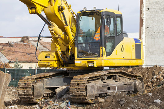 Hydraulic yellow excavator