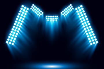 Obraz premium Bright stadium arena blue lighting spotlight vector illustration