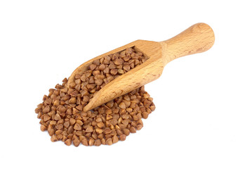 Buckwheat on wooden scoop isolated on white background
