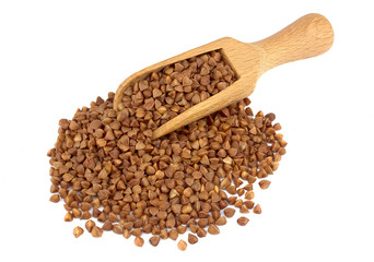 Buckwheat on wooden scoop isolated on white background