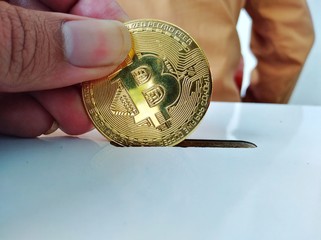 Fototapeta premium Golden bitcoin been used for donation on Friday prayer.