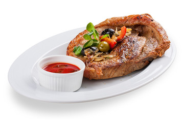 Pork steak Greek style. On a white background