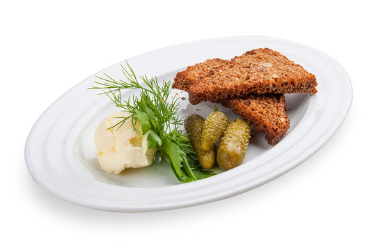 Snack to beer. Spicy toasts with pickled cucumbers. On a white background