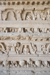 Bas-relief of Buddha and monks on the Stupa at Jaulian monastery, Taxila.
