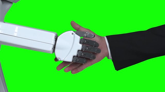 Robot shakes hands with a guy greets him. Green screen. Close up. Slow motion