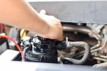 Obraz premium Engineers are repairing engines with tools.