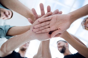 Multiracial Group of Friends with Hands in Stack
