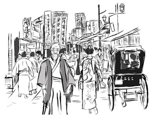 Street in Tokyo with people in traditional dress