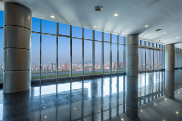 Panoramic skyline and buildings from glass window